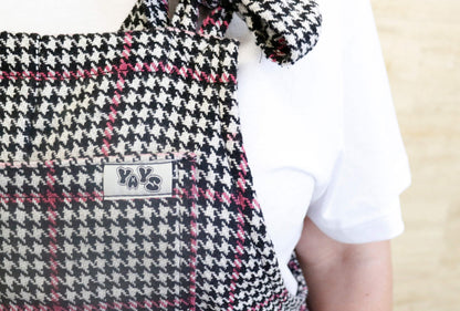 woman wearing YAYS dungarees in Red Checker, front view close-up, front pocket and YAYS logo details showing