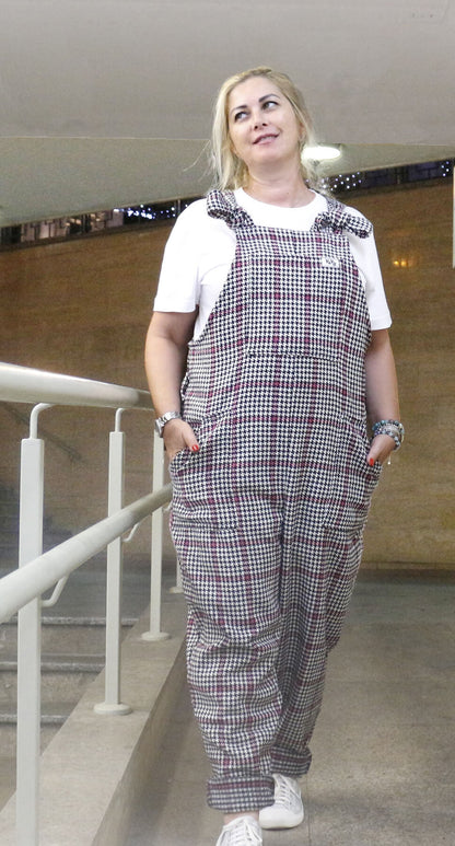 woman wearing YAYS cotton wool unisex dungarees, posing while walking, front view